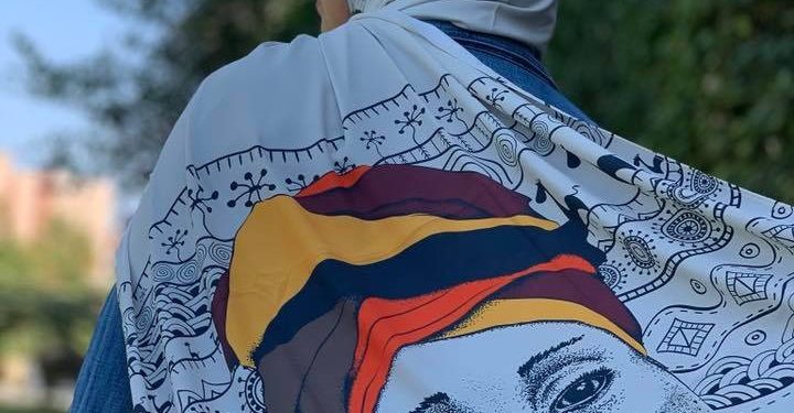 فتيات الجامعة الألمانية بالقاهرة يٌأصلن مفردات التراث النوبي على أغطية الرأس