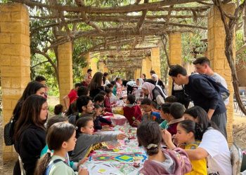 الأندية الطلابية بالجامعة الأمريكية تواصل جهودها لمساعدة  غير القادرين في رمضان