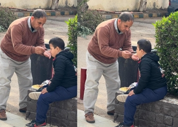 صورة معلم يُطعم طالب من ذوي الهمم تشعل السوشيال ميديا