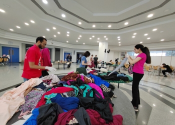 “علشانك يا بلدي” الجامعة الألمانية تنظم معرض ” عيدنا عيدين” لتوزيع الملابس بالجيزة