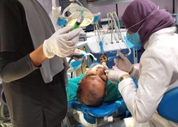 قافلة طبية علاجية من طب أسنان جامعة القاهرة بمنطقة العمرانية