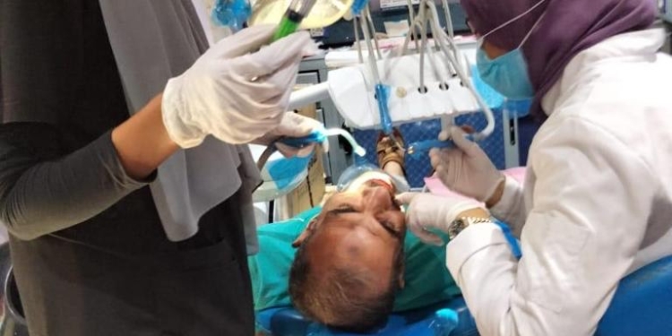 قافلة طبية علاجية من طب أسنان جامعة القاهرة بمنطقة العمرانية