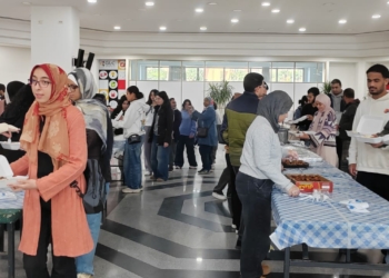 “علشانك يا بلدي” بالجامعة الألمانية تطلق مبادرة توزيع ملابس العيد للأسر المحتاجة